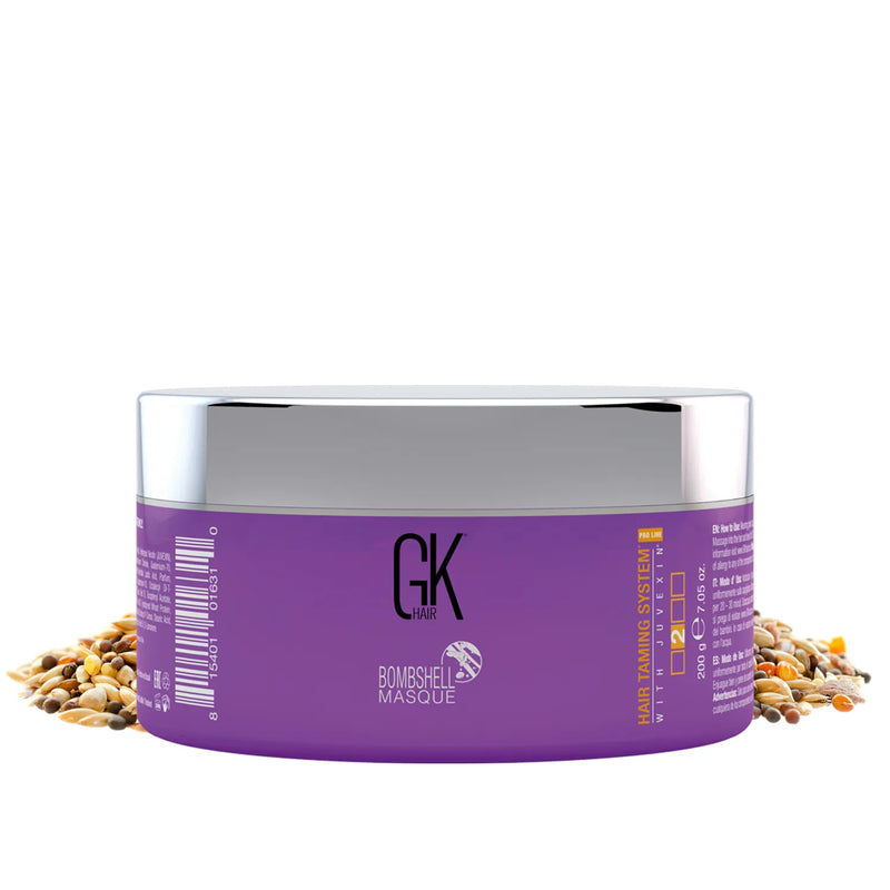 GK Hair Bombshell Masque 200 g purple jar with a chrome lid, mixed seeds scattered around it on white
