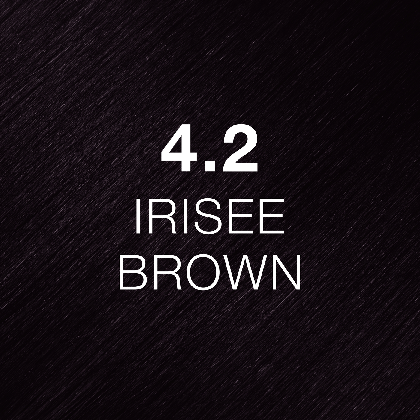 Silky hair texture showcasing the GK Hair's Juxevin Cream Color "4.2 Irisee Brown" in bold white text.