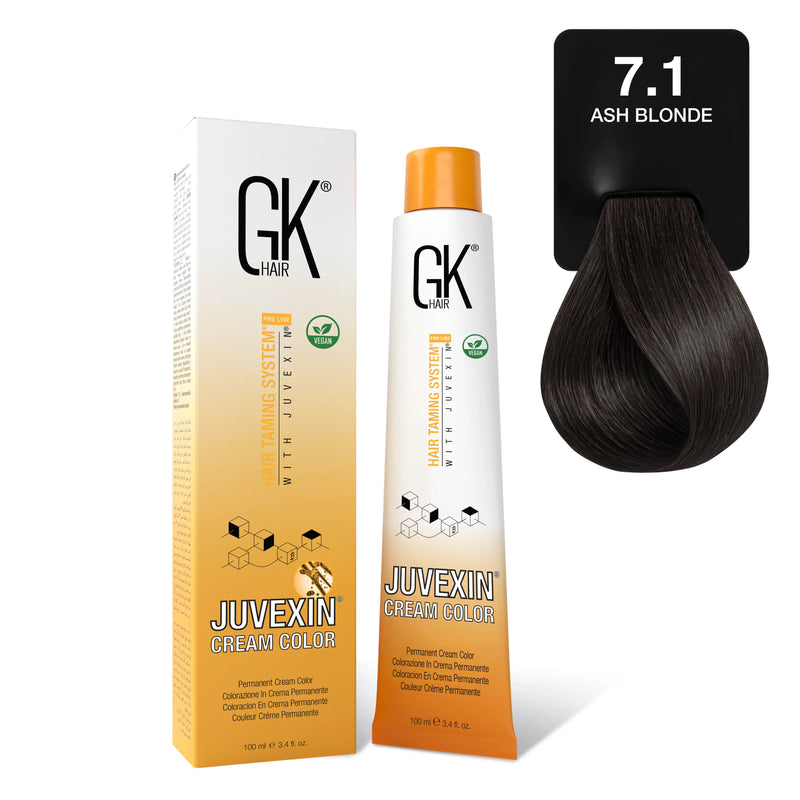 GK Hair Juvexin Cream Color 100 ml carton and tube beside a black card printing 7.1 Ash Blonde above a deep cool brown swatch
